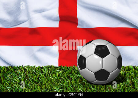 3D Fußball in Wiese mit England Flagge als Hintergrund gerendert Stockfoto
