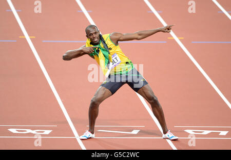 Olympische Spiele In London - Tag 13. Jamaikas Usain Bolt feiert den Sieg im 200-m-Finale der Männer am 12. Tag der Olympischen Spiele in London im Olympiastadion in London. Stockfoto