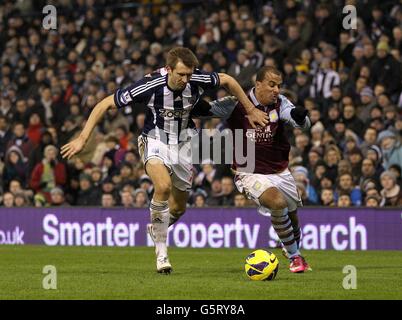 Gareth McAuley von West Bromwich Albion (links) und Gabriel von Aston Villa Agbonlahor (rechts) kämpft um den Ball Stockfoto