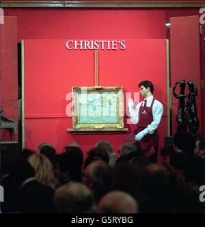 Van Goghs Ein Blick auf das Asylum und die Kapelle in Saint-Remy, die Elizabeth Taylor gehörte, erreichte bei Christies in London keinen unveröffentlichten Reservepreis. Die Ausschreibung wurde bei 5, 800 und 000 gestoppt. Stockfoto