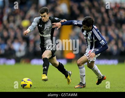 Fußball - Barclays Premier League - West Bromwich Albion gegen Tottenham Hotspur - The Hawthorns. Gareth Bale von Tottenham Hotspur (links) und Claudio Yacob von West Bromwich Albion kämpfen um den Ball Stockfoto