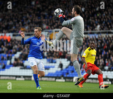 Peter Lovenkrands (links) von Birmingham City wird vom Watford-Torwart vereitelt Manuel Almunia (rechts) Stockfoto