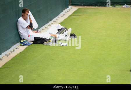 Jerzy Janowicz aus Polen bei einer Trainingseinheit am 10. Tag der Wimbledon Championships im All England Lawn Tennis and Croquet Club in Wimbledon. Stockfoto