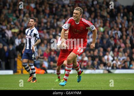 Fußball - Barclays Premier League - West Bromwich Albion gegen Southampton - The Hawthorns. Rickie Lambert aus Southampton feiert das Tor vom Strafpunkt aus Stockfoto