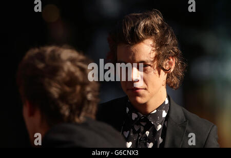 Harry Styles of One Direction Teilnahme an der Weltpremiere von One Direction: Das sind wir, am Empire Leicester Square im Zentrum von London. Stockfoto