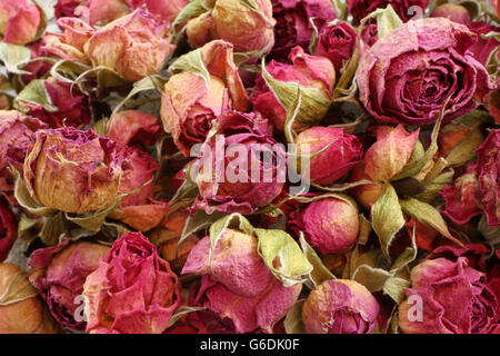 Essen-Hintergrund - stieg Haufen trockenen rosa Stockfoto