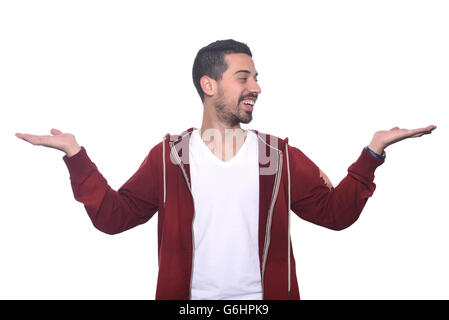 Potrait von jungen Latin-Mann etwas zu bieten. Isolierten weißen Hintergrund. Stockfoto