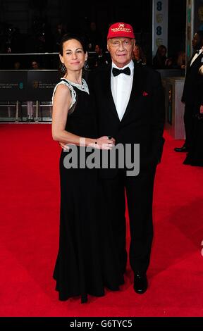 Niki Lauda und Birgit Wetzinger bei den EE British Academy Film Awards 2014 im Royal Opera House, Bow Street, London. Stockfoto