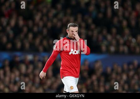 Fußball - UEFA Champions League - 16. Runde - zweite Etappe - Manchester United gegen Olympiakos - Old Trafford. Wayne Rooney von Manchester United reagiert Stockfoto