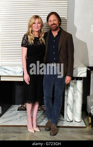 Kirsten Dunst und Viggo Mortensen waren vor der UK-Premiere am heutigen Abend bei einer Fotoaufnahme für den Film die zwei Gesichter des Januar im Corinthia Hotel in London. Stockfoto