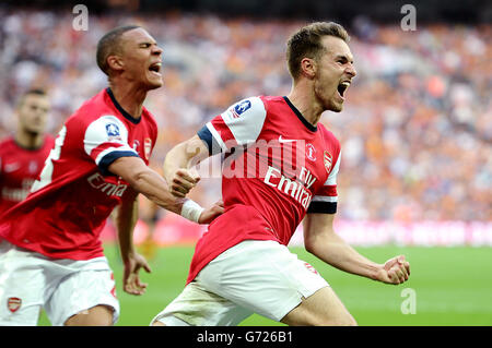 Fußball - FA Cup - Finale - Arsenal gegen Hull City - Wembley Stadium. Aaron Ramsey von Arsenal feiert, nachdem er das dritte Tor seines Teams erzielt hat Stockfoto