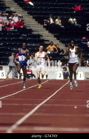 Leichtathletik, 100 Meter Männer. USA's Mel Lattany mit Jim Evans und Delwyne Clarke. Stockfoto