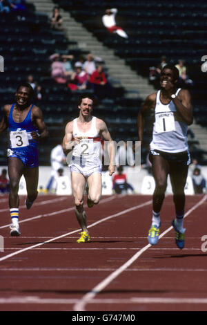 Leichtathletik – 100 Meter Männer. Mel Lattany, USA, mit Jim Evans und Delwyne Clarke. Stockfoto