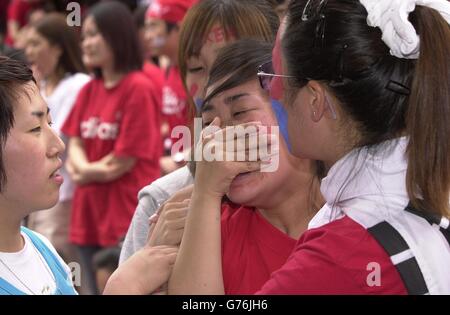 Südkoreanischen Fans sehen Team verlieren Stockfoto