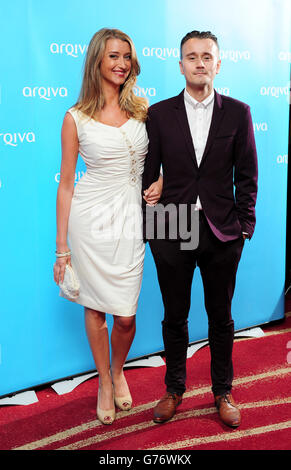 Pete Donaldson und Sarah Champion bei der Ankunft bei den Arqiva Commercial Radio Awards im Westminster Bridge Park Plaza Hotel, London. Stockfoto