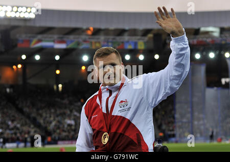 Sport - Commonwealth Games 2014 - Tag Acht. Der englische David Weir feiert mit seiner Goldmedaille nach dem Gewinn des 1500-m-T54-Finales für den Sport der Männer Stockfoto
