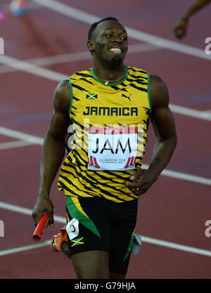 Jamaikas Usain Bolt feiert den Gewinn der Männer 4x100 m Staffel im Hampden Park, während der Commonwealth Games 2014 in Glasgow. Stockfoto