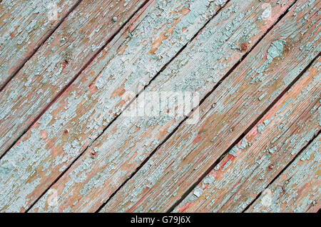 Fragment der Oberfläche der alten hölzernen Planken auf einem diagonalen Rahmen mit natürlichen Textur und einem schäbigen grüne Farbe für die Verwendung als ein Stockfoto