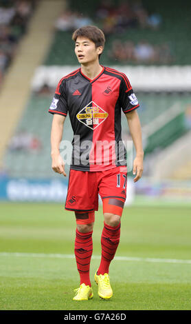 Fußball - vor der Saison freundlich - Plymouth Argyle / Swansea City - Home Park. Ki Sung-Yueng, Stadt Swansea Stockfoto