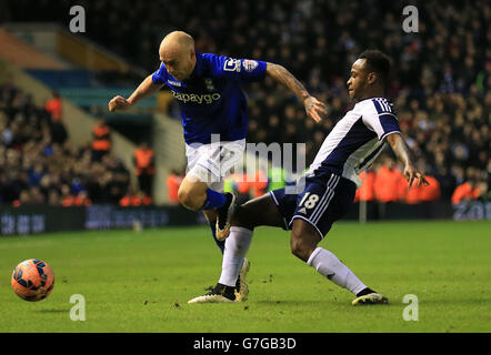 Der aus Birmingham stammende David Cotterill (links) und der aus West Bromwich stammende Albion SaidoBerahino kämpfen während des Spiels der vierten Runde des FA Cup in St. Andrews, Birmingham, um den Ball. Stockfoto