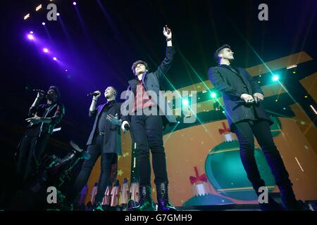 EXKLUSIV - Union J live auf der Bühne während der Capital FM Jingle Bell Ball 2014 in der O2 Arena, London statt Stockfoto