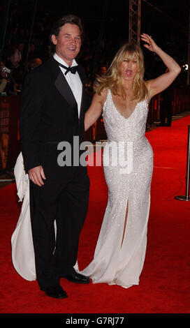 Orange British Academy Film Awards - Odeon - Leicester Square. Kurt Russell und Goldie Hawn, die ein Kleid von Versace tragen. Stockfoto