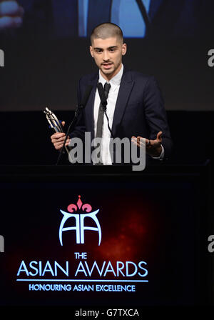 Das ehemalige One Direction Bandmitglied Zayn Malik erhält seinen hervorragenden Preis für Musik bei den British Asian Awards 2015 im Grosvenor House Hotel, London. Stockfoto