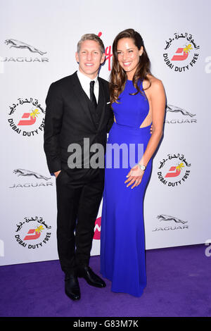 Bastian Schweinsteiger und Ana Ivanovic bei der WTA Pre-Wimbledon Party in den Roof Gardens, Kensington, London. DRÜCKEN SIE VERBANDSFOTO. Bilddatum: Donnerstag, 25. Juni 2015. Siehe PA Story SHOWBIZ Wimbledon. Der Bildnachweis sollte lauten: Dominic Lipinski/PA Wire Stockfoto