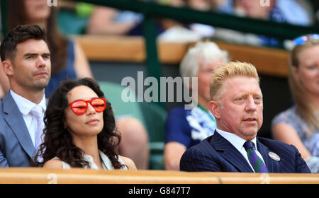 Tennis - Wimbledon Championships 2015 - Tag sechs - All England Lawn Tennis und Croquet Club. Boris Becker und seine Frau Lily während des sechsten Tages der Wimbledon Championships im All England Lawn Tennis und Croquet Club, Wimbledon. Stockfoto