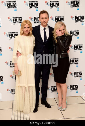 Sienna Miller, Tom Hiddleston und Elisabeth Moss bei der High-Rise Premiere während des 59. BFI London Film Festival im Odeon Cinema, Leicester Square, London. DRÜCKEN Sie VERBANDSFOTO. Bilddatum: Freitag, 9. Oktober 2015. Bildnachweis sollte lauten: Ian West/PA Wire Stockfoto