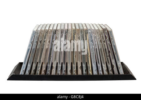 Gestapelte alte Grunge CD Halter auf weiß Stockfoto