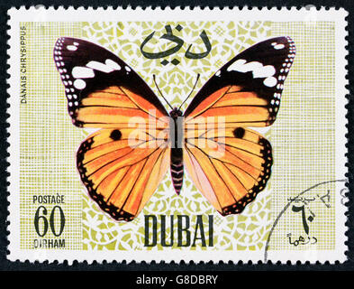 GROOTEBROEK, Niederlande - März 8,2016: eine Briefmarke gedruckt von Dubai, zeigt tropischer Schmetterling, ca. 1968 Stockfoto