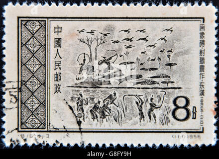 CHINA - CIRCA 1956: Eine Briefmarke gedruckt in China gewidmet Landwirtschaft und Jagd, ca. 1956 Stockfoto