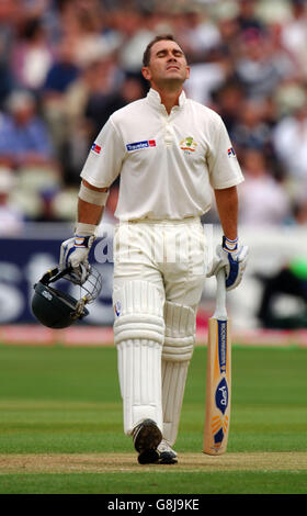 Der Australier Justin langer spürt die Auswirkungen, auf die er getroffen wird Der Kopf Stockfoto