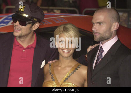 Stars des Films Johnny Knoxville (links), Jessica Simpson und Seann William Scott. Stockfoto