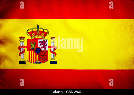 Spanische Flagge, gelben und roten Tuch mit Spanien Hoheitszeichen, Grunge patriotischen Stiltapeten Stockfoto