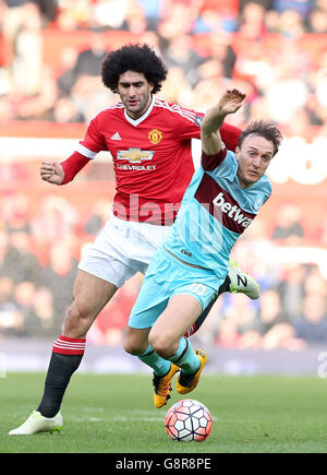 Marouane Fellaini von Manchester United (links) und Mark Noble von West Ham United kämpfen während des Emirates FA Cup, Quarter Final Matches in Old Trafford, Manchester, um den Ball. DRÜCKEN SIE VERBANDSFOTO. Bilddatum: Sonntag, 13. März 2016. Siehe PA-Story SOCCER man Utd. Bildnachweis sollte lauten: Martin Rickett/PA Wire. Stockfoto