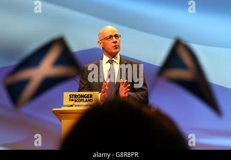 Der stellvertretende erste Minister John Swinney spricht auf der SNP-Frühjahrstagung beim SECC in Glasgow. Stockfoto