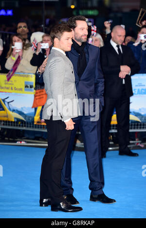 Taron Egerton und Hugh Jackman bei der Europa-Premiere von Eddie the Eagle im Odeon Cinema am Leicester Square in London. DRÜCKEN Sie VERBANDSFOTO. Bilddatum: Donnerstag, 17. März 2016. Siehe PA Story SHOWBIZ Eagle. Bildnachweis sollte lauten: Ian West/PA Wire Stockfoto