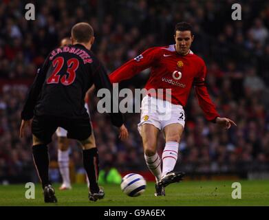 John O'Shea von Manchester United tritt gegen Grant Leadbitter von Sunderland an Stockfoto