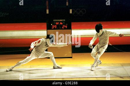 Olympische Spiele 2000 in Sydney – Fechten – Männer: Team Foil – Halbfinale – Italien – China. Einzäunung Stockfoto