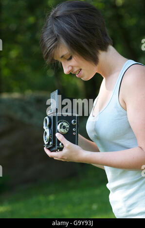 Junge Frau fotografieren Stockfoto