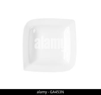 Weißen tief wellenförmigen quadratische Porzellanteller Stockfoto