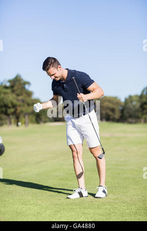 Golfer, ballte die Fäuste Stockfoto