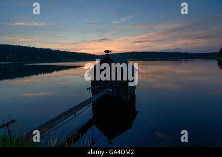 Heidenreichstein Anglerhütte, Karpfenteich Winkelauerteich in der Natur park Heidenreichsteiner Moor bei Sonnenuntergang Österreich Niederöst Stockfoto