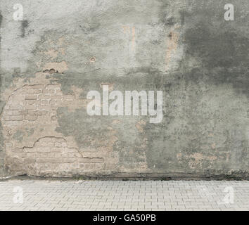 Städtischen Hintergrund. Grunge veraltet Straße Wand und Pflaster. Stockfoto