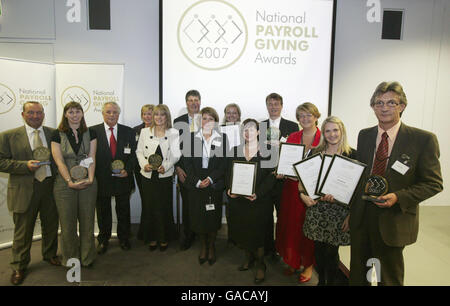 Die Gewinner und hoch ausgezeichnet der ersten nationalen Gehaltsabrechnung, die vom Institute of Fundraising vergeben wurde und heute Abend im HM Treasury stattfand. Die Veranstaltung wird anlässlich des 20. Jahrs der Gehaltsabrechnung gestartet. Stockfoto