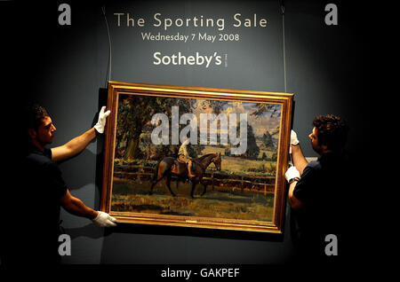 Sir Alfred J. Munnings Portrait A Boy and his Pony - Portrait of Daffern Seal on Canary, das voraussichtlich im nächsten Monat für 1.5-2.5 Millionen verkauft wird, wird in Sotheby's Auktionshaus, New Bond Street, London, vorgestellt. Stockfoto