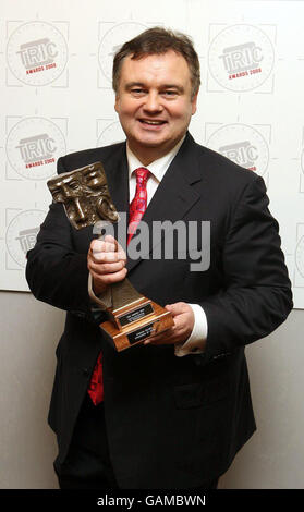 Eamonn Holmes gewinnt die Persönlichkeit des Satelliten- und Digitalfernsehens bei den TRIC Awards im Grosvenor Hotel in London. Stockfoto