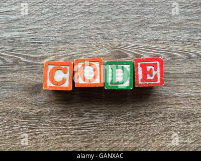Code-Wort gemacht mit Spielzeug Holz-Block Buchstaben Stockfoto